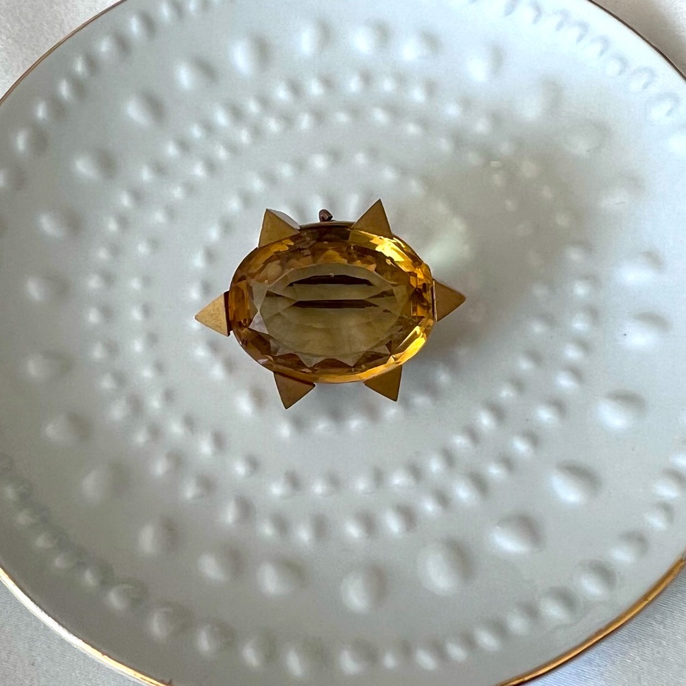 Citrine Brooch/Pendant. Large gem with a 9 carat gold starburst frame. Antique
